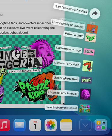 Zbliżenie na dół ekranu z wachlarzem plików wychodzących pionowo z Docku
